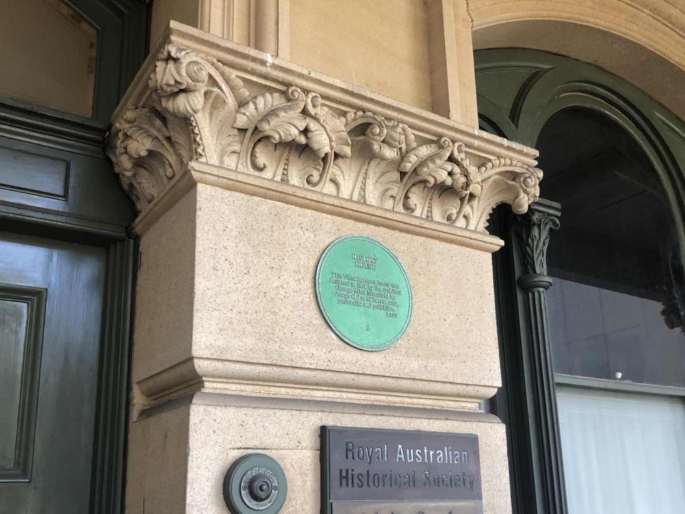 Green Plaque outside the front door of History House.