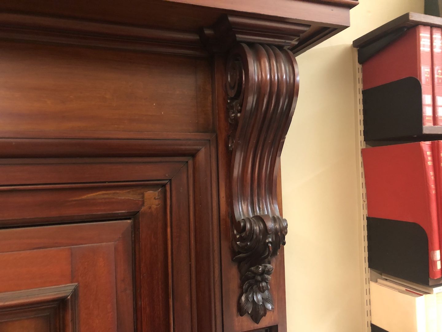 Wooden cornices of the doorframe in the History House library.