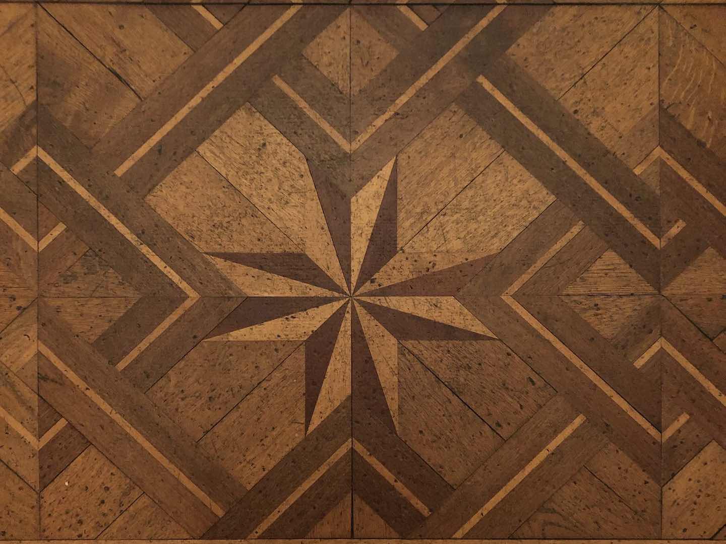History House's parquet floor designed in the shape of an eight-point star.