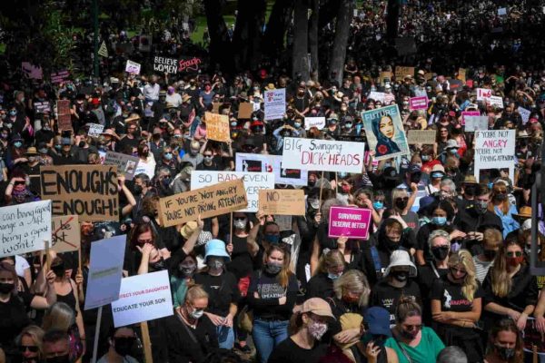 Many protesters at the first International Women’s Day Rally in Melbourne 8 March 1975 and another of protesters from the Melbourne March for Justice 15 March 2021.