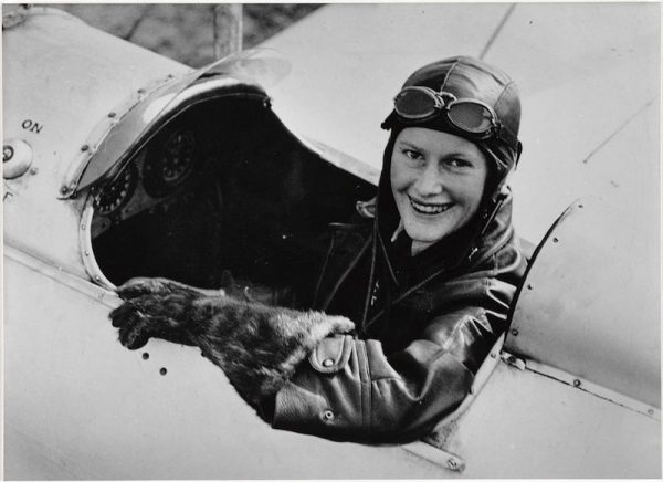 Nancy Bird sitting in Gipsy Moth at Kingsford Smith flying School 1933.