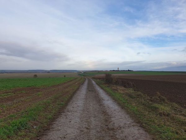 A dirt walking track from Villers-Bretonneux to the Australian National Memorial in the distance.