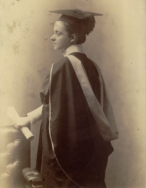 Photograph taken of Iza Coghlan in her graduation robes in 1893.