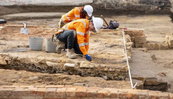 A photograph of archaeologists excavating the Parramatta Metro Site.