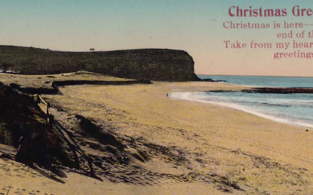 A postcard depicting Narrabeen Beach at sunset. The card includes a 'Christmas Greeting': 'Christmas is here - end of the year; Take from my heart, greetings sincere.
